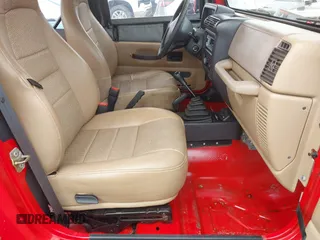 1999 Jeep Wrangler SE z VIN 1J4FY29P5XP487111, wystawiony jako IAAI lot #42125867 z przebiegiem 156 804 mil mil oraz . Historia ofert i sprzedaży dostępna na DreamBid. Obrazek 5.