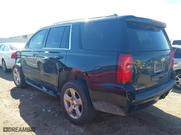 2017 Chevrolet Tahoe LS with VIN 1GNSCAKC8HR360581, listed as a IAAI auction lot 41365169 with 137,369 mi miles. Bid and sale history available at carsss.com. Image 3.
