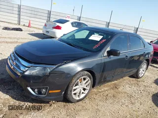 2011 Ford Fusion SEL with VIN 3FAHP0JA7BR319183, listed as a IAAI auction lot 41829886 with 119,302 mi miles. Bid and sale history available at carsss.com. Image 2.