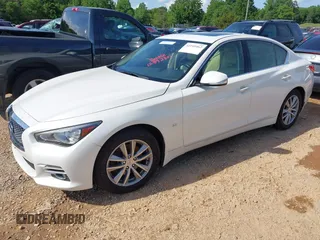 2015 Infiniti Q50 Premium with VIN JN1BV7ARXFM414391, listed as a IAAI auction lot 42245462 with 216,495 mi miles and . Bid and sale history available at DreamBid. Image 2.