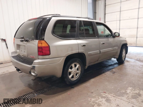2003 GMC Envoy SLE z VIN 1GKDT13S432299338, wystawiony jako IAAI lot #41443555 z przebiegiem 161 918 mil mil oraz . Historia ofert i sprzedaży dostępna na DreamBid. Obrazek 4.