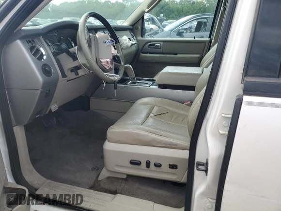 2013 Ford Expedition Limited z VIN 1FMJU1K54DEF55738, wystawiony jako Copart lot #56930915 z przebiegiem 147 658 mil mil oraz Szkoda całkowita • Salvage title. Historia ofert i sprzedaży dostępna na DreamBid. Obrazek 7.