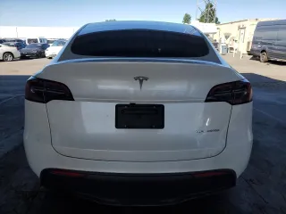 2024 Tesla Model Y Long Range с VIN 7SAYGDEE0RF981488, выставлен на аукционе Copart как лот 58704135 с пробегом 21 417 миль миль и Списание • Salvage title. История ставок и продаж доступна на DreamBid. Изображение 6.