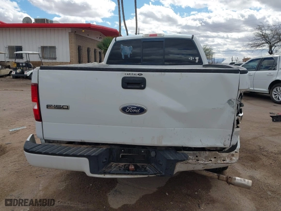 2005 Ford F-150 XL with VIN 1FTRF12W05NB36068, listed as a IAAI auction lot 41732744 with 203,261 mi miles. Bid and sale history available at carsss.com. Image 16.