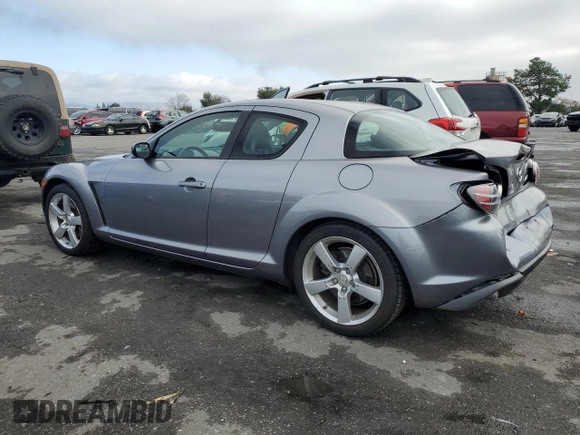 2004 Mazda RX-8 with VIN JM1FE17N740117681, listed as a Copart auction lot 85284094 with 138,555 mi miles and Salvage Title. Bid and sale history available at DreamBid. Image 2.