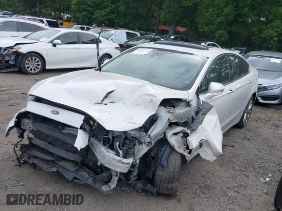 2017 Ford Fusion Titanium with VIN 3FA6P0K96HR105127, listed as a IAAI auction lot 39351701 with 103,295 mi miles. Bid and sale history available at carsss.com. Image 19.