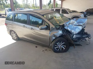 2012 Mazda 5 Sport with VIN JM1CW2BL3C0142202, listed as a IAAI auction lot 42397815 with Not provided miles and . Bid and sale history available at DreamBid. Image 1.