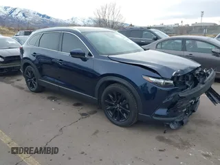 2022 Mazda CX-9 Touring Plus with VIN JM3TCBAY6N0616918, listed as a IAAI auction lot 41242341 with 22,384 mi miles and . Bid and sale history available at carsss.com. Image 1.