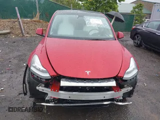 2023 Tesla Model Y Long Range with VIN 7SAYGDEE5PA111262, listed as a IAAI auction lot 42341148 with 19,014 mi miles and . Bid and sale history available at DreamBid. Image 6.
