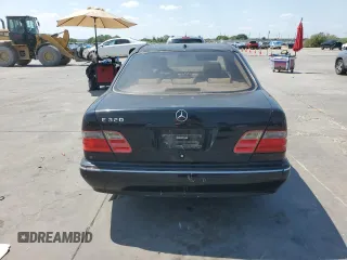 2001 Mercedes-Benz E-Class with VIN WDBJF65J01B225871, listed as a Copart auction lot 66136994 with 2,139,454 mi miles and Clean Title. Bid and sale history available at carsss.com. Image 6.