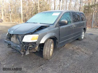 2010 Dodge Grand Caravan SE with VIN 2D4RN4DE7AR397092, listed as a IAAI auction lot 41084684 with 117,747 mi miles. Bid and sale history available at carsss.com. Image 2.