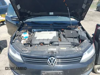 2013 Volkswagen Jetta TDI w/Premium z VIN 3VW3L7AJ4DM275326, wystawiony jako IAAI lot #42113541 z przebiegiem 166 357 mil mil oraz . Historia ofert i sprzedaży dostępna na DreamBid. Obrazek 10.