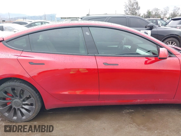 2021 Tesla Model 3 Performance with VIN 5YJ3E1EC5MF050598, listed as a IAAI auction lot 41778169 with 74,710 mi miles and . Bid and sale history available at carsss.com. Image 14.