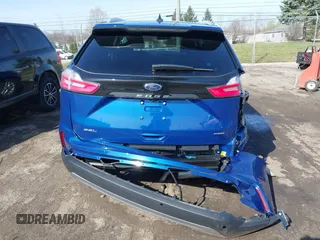 2024 Ford Edge SEL z VIN 2FMPK4J96RBA12822, wystawiony jako IAAI lot #41940628 z przebiegiem 8 981 mil mil oraz . Historia ofert i sprzedaży dostępna na DreamBid. Obrazek 17.