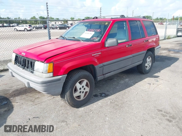 1995 Jeep Grand Cherokee Laredo with VIN 1J4FX58S9SC686074, listed as a IAAI auction lot 42451786 with 82,249 mi miles and . Bid and sale history available at DreamBid. Image 2.