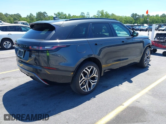 2020 Land Rover Range Rover Velar R-Dynamic S z VIN SALYK2EX5LA243809, wystawiony jako IAAI lot #42200383 z przebiegiem 66 381 mil mil oraz . Historia ofert i sprzedaży dostępna na DreamBid. Obrazek 4.