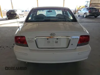 2003 Hyundai Sonata with VIN KMHWF25S03A777626, listed as a Copart auction lot 79746814 with 174,124 mi miles and Salvage Title. Bid and sale history available at carsss.com. Image 6.