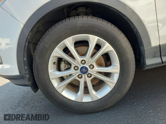 2017 Ford Escape SE z VIN 1FMCU0GD4HUB05330, wystawiony jako IAAI lot #42396863 z przebiegiem 66 420 mil mil oraz . Historia ofert i sprzedaży dostępna na DreamBid. Obrazek 14.