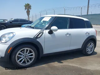 2016 MINI Countryman S with VIN WMWZC3C51GWT10248, listed as a IAAI auction lot 42359191 with 77,157 mi miles and . Bid and sale history available at DreamBid. Image 14.