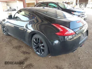 2015 Nissan 370Z Sport with VIN JN1AZ4EH3FM442775, listed as a IAAI auction lot 41960249 with 125,780 mi miles and . Bid and sale history available at DreamBid. Image 3.