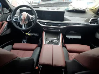 2025 BMW X6 M60i with VIN 5UX43EX01S9X34140, listed as a Copart auction lot 82425694 with 6,844 mi miles and Salvage Title. Bid and sale history available at carsss.com. Image 8.