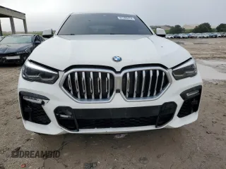 2021 BMW X6 sDrive40i z VIN 5UXCY4C08M9F34312, wystawiony jako Copart lot #87206474 z przebiegiem 67 851 mil mil oraz Czysty tytuł • Clean title. Historia ofert i sprzedaży dostępna na DreamBid. Obrazek 5.
