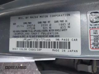 2014 Mazda 3 i SV with VIN JM1BM1T73E1171466, listed as a IAAI auction lot 41999827 with 157,739 mi miles and . Bid and sale history available at DreamBid. Image 9.