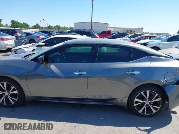2016 Nissan Maxima SR with VIN 1N4AA6AP9GC414943, listed as a IAAI auction lot 41976295 with 154,738 mi miles and . Bid and sale history available at DreamBid. Image 15.
