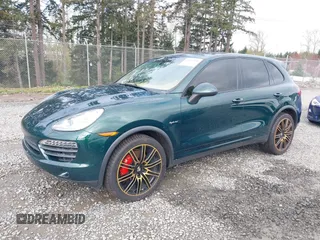 2012 Porsche Cayenne S Hybrid z VIN WP1AE2A20CLA92813, wystawiony jako IAAI lot #41916936 z przebiegiem 145 503 mil mil oraz . Historia ofert i sprzedaży dostępna na DreamBid. Obrazek 2.