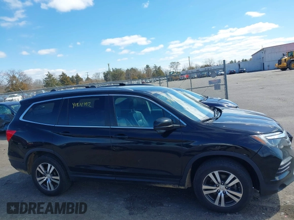2016 Honda Pilot EX-L with VIN 5FNYF5H57GB023852, listed as a IAAI auction lot 41811412 with 151,707 mi miles and . Bid and sale history available at DreamBid. Image 13.