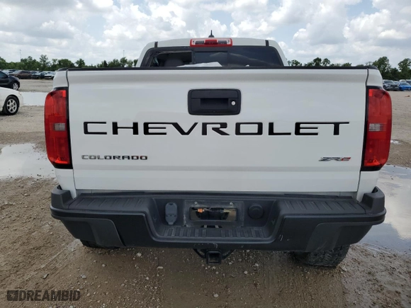 2021 Chevrolet Colorado 4WD ZR2 with VIN 1GCGTEEN0M1108190, listed as a Copart auction lot 54159655 with 64,447 mi miles and Salvage Title. Bid and sale history available at carsss.com. Image 6.