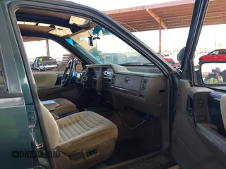 1994 Jeep Grand Cherokee Laredo with VIN 1J4GZ58S4RC280650, listed as a IAAI auction lot 42041261 with 199,265 mi miles and . Bid and sale history available at DreamBid. Image 5.