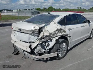 2014 Ford Fusion Energi Titanium with VIN 3FA6P0SU0ER149155, listed as a IAAI auction lot 41519306 with 148,406 mi miles. Bid and sale history available at carsss.com. Image 6.