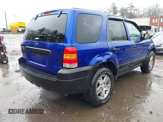 2005 Ford Escape XLT with VIN 1FMCU93125KA41795, listed as a IAAI auction lot 41931869 with 156,421 mi miles and . Bid and sale history available at DreamBid. Image 4.