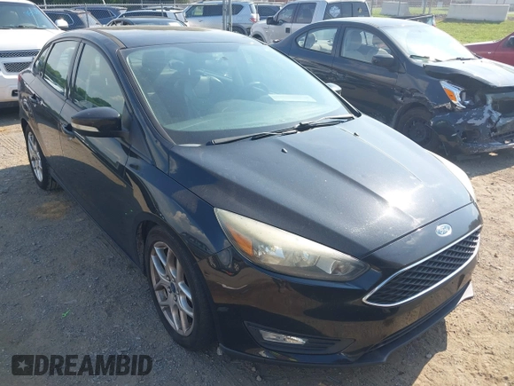 2015 Ford Focus SE z VIN 1FADP3F25FL284097, wystawiony jako IAAI lot #42553323 z przebiegiem 139 647 mil mil oraz . Historia ofert i sprzedaży dostępna na DreamBid. Obrazek 6.