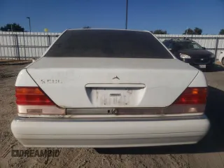 1995 Mercedes-Benz S with VIN WDBGA51E1SA247994, listed as a Copart auction lot 75966224 with 125,240 mi miles and Clean Title. Bid and sale history available at DreamBid. Image 6.