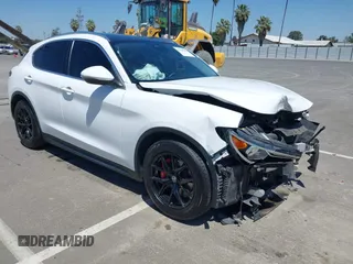 2018 Alfa Romeo Stelvio z VIN ZASFAKAN0J7B72784, wystawiony jako IAAI lot #42148165 z przebiegiem 83 996 mil mil oraz . Historia ofert i sprzedaży dostępna na DreamBid. Obrazek 1.