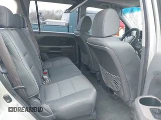 2007 Honda Pilot LX with VIN 2HKYF18157H530370, listed as a IAAI auction lot 41967033 with 214,590 mi miles and . Bid and sale history available at DreamBid. Image 8.
