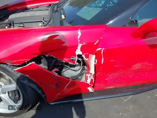 2015 Chevrolet Corvette 1LT z VIN 1G1YA2D77F5122992, wystawiony jako IAAI lot #42386670 z przebiegiem 59 722 mil mil oraz . Historia ofert i sprzedaży dostępna na DreamBid. Obrazek 18.