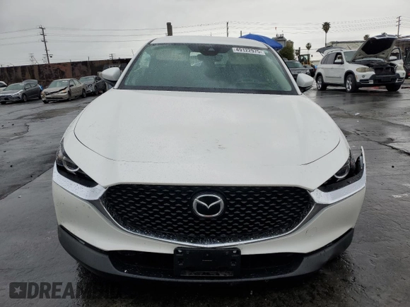 2023 Mazda CX-30 S with VIN 3MVDMBAM4PM522056, listed as a Copart auction lot 49122975 with 16,624 mi miles and Salvage title. Bid and sale history available at DreamBid. Image 5.