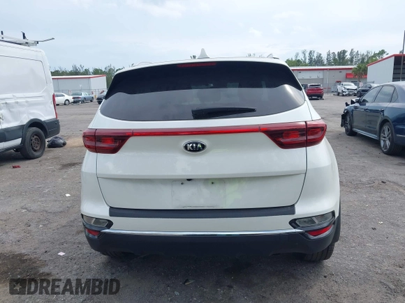 2021 Kia Sportage EX with VIN KNDPN3AC5M7856515, listed as a IAAI auction lot 41879128 with 56,537 mi miles and . Bid and sale history available at DreamBid. Image 16.