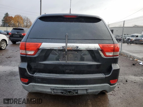 2011 Jeep Grand Cherokee Laredo with VIN 1J4RS4GG8BC508482, listed as a Copart auction lot 79261304 with 208,265 mi miles and Salvage Title. Bid and sale history available at DreamBid. Image 6.