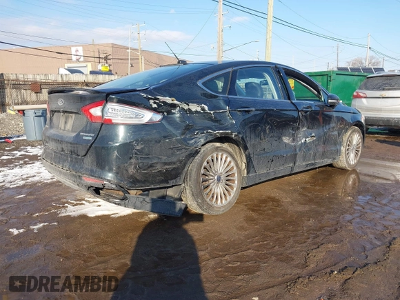 2014 Ford Fusion Titanium with VIN 3FA6P0K90ER336116, listed as a IAAI auction lot 41559792 with 132,852 mi miles. Bid and sale history available at carsss.com. Image 4.