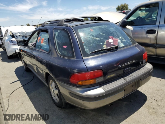 1996 Subaru Impreza Outback with VIN JF1GF4851TG811571, listed as a Copart auction lot 65650514 with 248,315 mi miles and Salvage title. Bid and sale history available at DreamBid. Image 2.