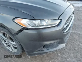 2015 Ford Fusion SE Hybrid with VIN 3FA6P0LU1FR219908, listed as a IAAI auction lot 41272688 with 310,452 mi miles. Bid and sale history available at carsss.com. Image 6.