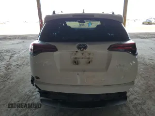 2018 Toyota RAV4 XLE with VIN JTMWFREV2JJ740145, listed as a Copart auction lot 52214075 with 129,940 mi miles and Salvage title. Bid and sale history available at DreamBid. Image 6.