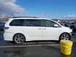 2014 Toyota Sienna SE with VIN 5TDXK3DC1ES422510, listed as a IAAI auction lot 41030376 with Not Provided miles and . Bid and sale history available at DreamBid. Image 14.