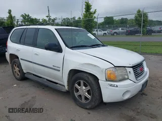 2006 GMC Envoy SLT with VIN 1GKDT13S762335947, listed as a IAAI auction lot 42536163 with 260,081 mi miles and . Bid and sale history available at DreamBid. Image 1.