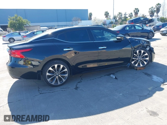2016 Nissan Maxima SL with VIN 1N4AA6AP9GC448087, listed as a IAAI auction lot 41828781 with 99,436 mi miles and . Bid and sale history available at DreamBid. Image 4.