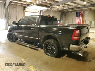2019 Ram 1500 Limited with VIN 1C6SRFHT1KN810346, listed as a Copart auction lot 56713315 with 87,066 mi miles and Salvage title. Bid and sale history available at DreamBid. Image 2.